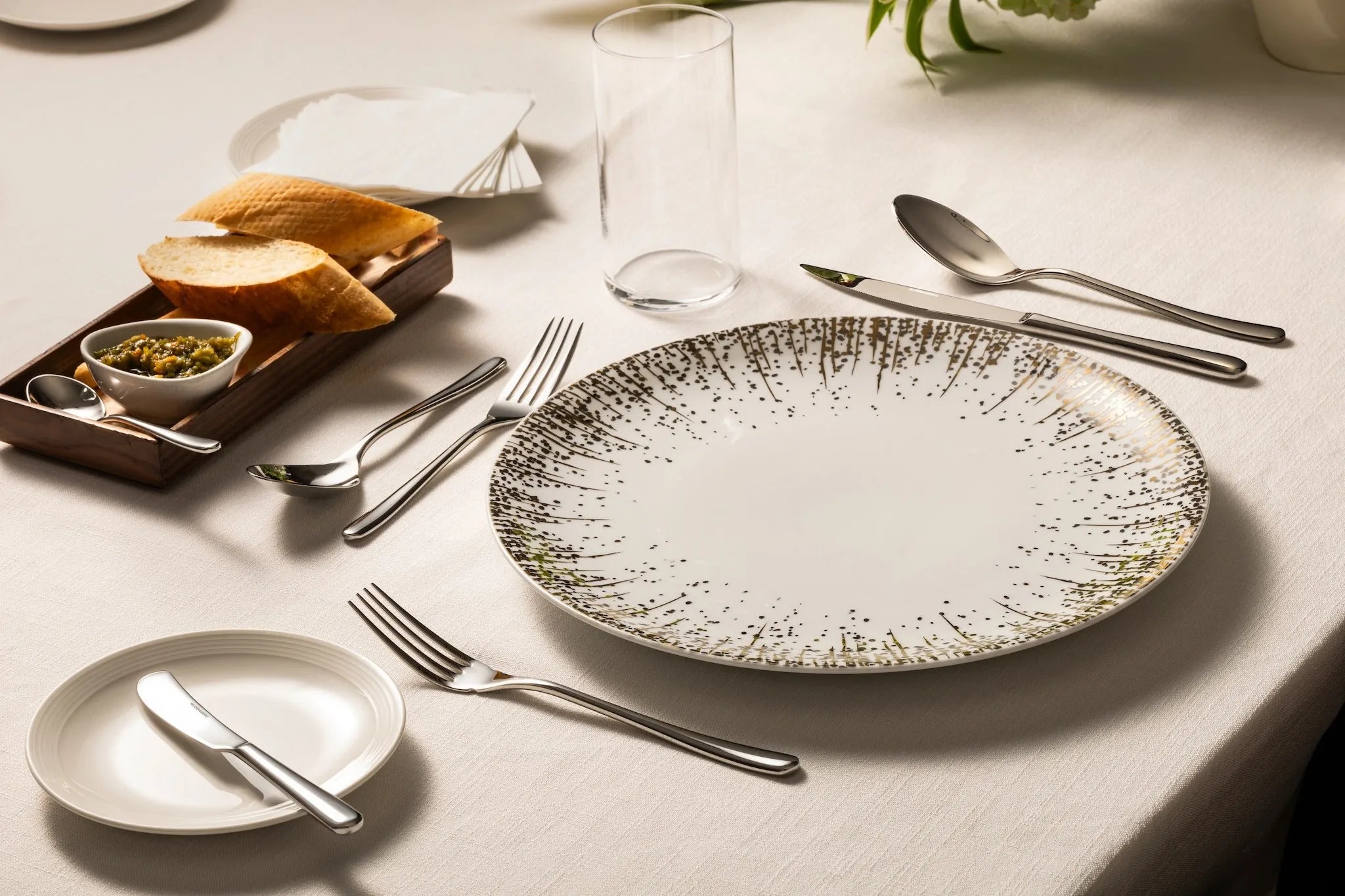 Wudengberg tableware arranged for a hospitality setting